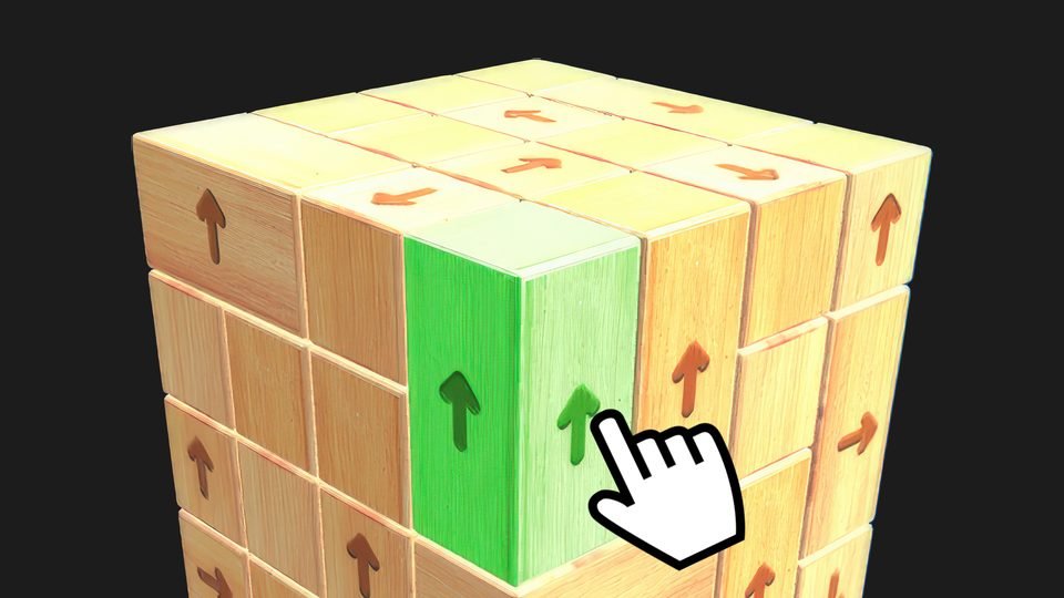 A cube made of wooden blocks with arrows on them, and a hand tapping a green block.